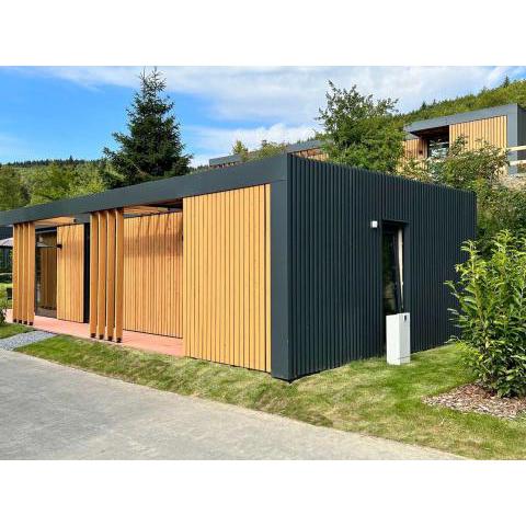Modern holiday home with hot tub, on a holiday park 100 m from the slopes