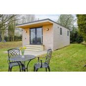 Secluded Log Cabin in beautiful private gardens